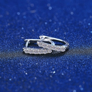 Sparkling S925 sterling silver hoop earrings with double row moissanite on blue background