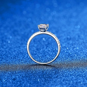 Elegant S925 silver ring featuring radiant cut moissanite and pave setting diamond accents