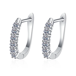 S925 sterling silver hoop earrings with row of moissanite stones on white background