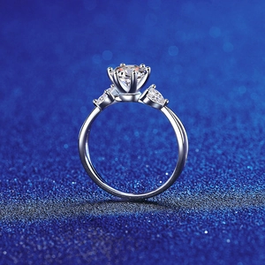 S925 sterling silver ring with 1 carat round moissanite and pear-shaped side stones