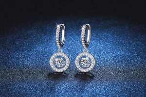 Macro detail of S925 sterling silver earrings featuring 0.5ct Moissanite and micro-pave diamonds