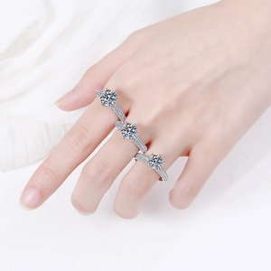 Elegant S925 sterling silver moissanite ring with a classic six-prong setting on finger
