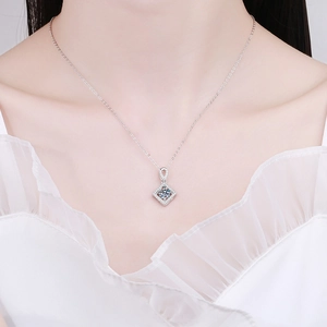 Elegant S925 sterling silver square moissanite pendant necklace worn by a female model