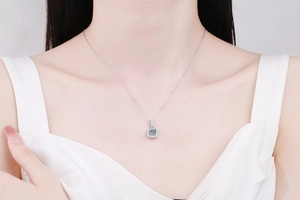 Elegant s925 silver necklace with 1 carat moissanite pendant shown on a model