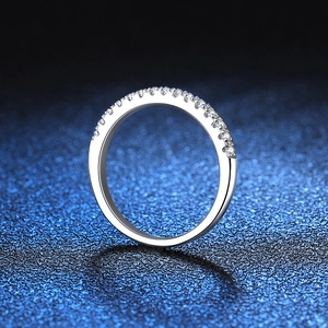 Elegant S925 sterling silver band ring featuring a row of shimmering moissanite stones