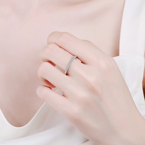Elegant S925 sterling silver eternity ring with a row of brilliant round cut moissanite stones