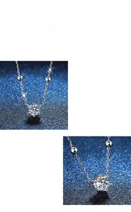 Vue détaillée du pendentif en moissanite ronde avec finition de polissage allemande