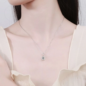 Elegant S925 sterling silver halo pendant necklace with a brilliant round moissanite stone