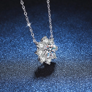 S925 sterling silver sunflower necklace with 1 carat moissanite on dark blue background