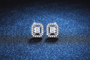 Detailed view of emerald cut moissanite stud earrings in S925 sterling silver setting