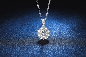 Macro shot of 1ct Moissanite sunflower necklace with zircon halo on blue textured background