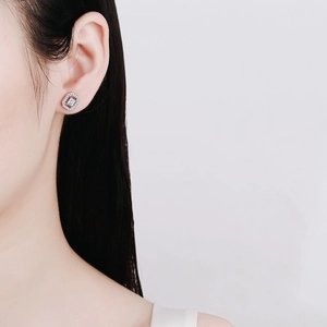 Classic S925 silver rectangle moissanite halo stud earrings worn by a female model
