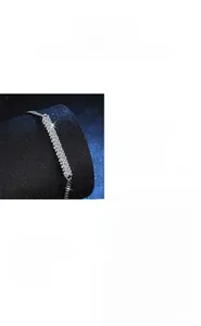 Macro detail of S925 silver moissanite tennis bracelet with brilliant cut pavé setting