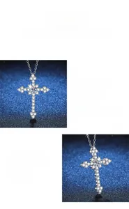 Detail showing high-quality Moissanite cross pendant with premium polished finish