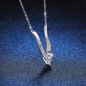 S925 sterling silver Mobius necklace featuring a 0.8ct pear-cut moissanite pendant