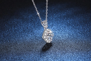 Macro detail of S925 sterling silver necklace with sparkling cluster diamond pendant