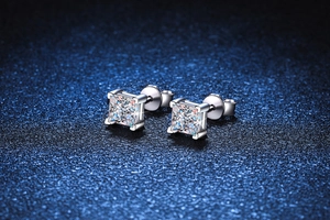 Macro view of S925 silver stud earrings with princess cut moissanite and four-prong setting