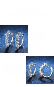 Détail des créoles en argent sterling S925 serties de pierres rondes en moissanite