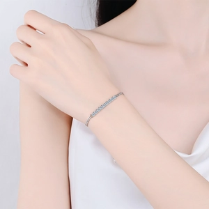 Elegant s925 silver Cuban chain bracelet with light blue moissanite stones on wrist