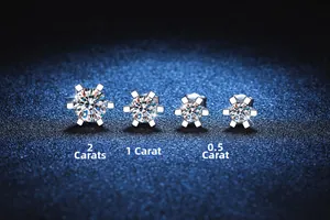 Size comparison of 0.5ct, 1ct, and 2ct moissanite stud earrings in six-prong setting