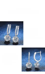 Détail de boucles d'oreilles moissanite en argent 925 avec fermoir en U et pavé