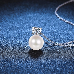 Elegant S925 silver necklace featuring a round white pearl and a moissanite pendant