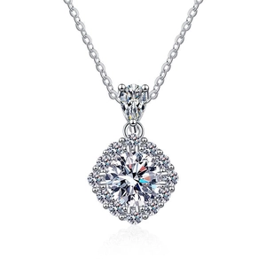 Elegant S925 sterling silver necklace featuring 1 carat round moissanite pendant on white base
