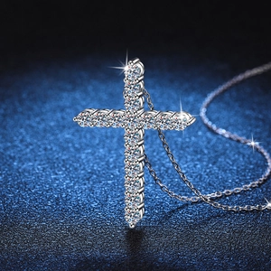 Sparkling S925 silver cross pendant necklace with 1.6 carat moissanite on blue background