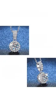 Vue macro d'un pendentif moissanite 1ct avec monture halo et chaîne en argent polie