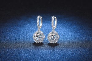 Macro detail of S925 silver flower earrings with a 1ct Moissanite center stone