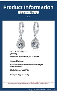 Detail showing pear-cut moissanite earrings with S925 silver and polished platinum finish