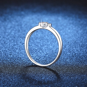 Polished S925 sterling silver moissanite ring with a brilliant round cut diamond setting