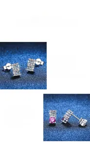 Detailed close-up of s925 silver moissanite stud earrings in white and pink tones