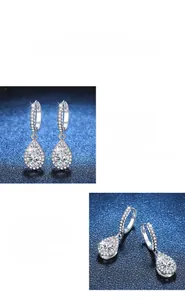 Macro detail of pear cut moissanite earring in S925 silver with platinum finish