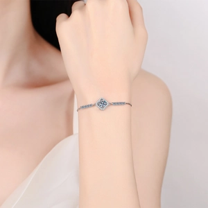 Elegant s925 silver moissanite bracelet with square halo pendant on female wrist