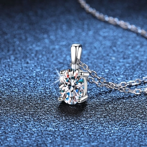 Elegant S925 sterling silver necklace with oval cut moissanite pendant on blue background