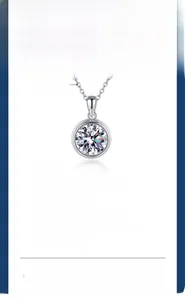 Detail of s925 silver moissanite necklace featuring a 1ct to 3ct solitaire round cut pendant