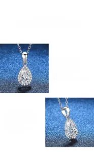 Gros plan du pendentif en moissanite goutte avec halo micro-pave et chaîne en argent s925