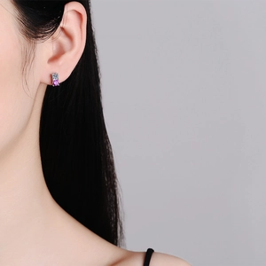 Elegant S925 sterling silver studs featuring double round-cut white and pink moissanite stones