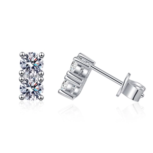 S925 sterling silver classic four-prong moissanite stud earrings on white background