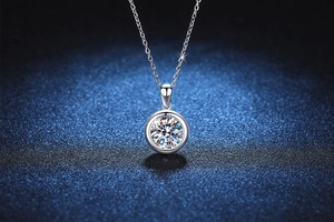 Macro view of classic round moissanite pendant on a 925 sterling silver chain