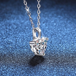 Elegant s925 silver heart pendant necklace with 1 carat moissanite on a starry background