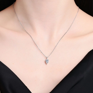 Elegant S925 silver necklace with a 1 carat teardrop moissanite pendant on a female model