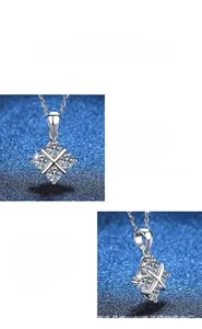 Détail macro du collier attrape-rêves en argent S925 avec pendentif croix en moissanite