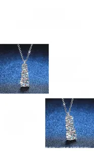 Vue macro d'un collier en argent S925 avec trois diamants moissanite empilés à la verticale