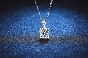 Macro shot of S925 sterling silver bull-head necklace with D color 1 carat moissanite pendant