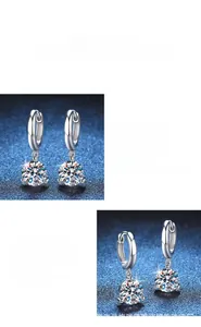Detail view of S925 sterling silver three-prong moissanite earrings with polished finish