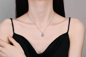 Classic S925 silver necklace featuring a brilliant 1 carat moissanite pendant on model