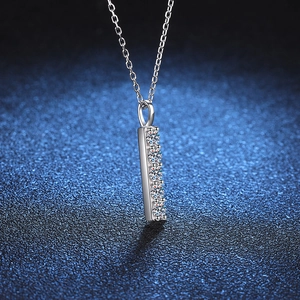 S925 sterling silver vertical bar pendant necklace with Moissanite stones on blue texture