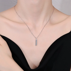 Elegant S925 sterling silver necklace featuring a sparkling vertical moissanite bar pendant
